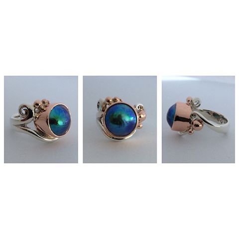 This sweet little ring needs s home. It's such a tiny size so I thought if I put it on here more tiny fingered people might see it!! It's a K1/2 to K3/4. Set with an 11mm Pacific Blue Pearl from Eyris Pearls in New Zealand in 9ct Rose Gold and Sterling Silver. It is one of my free formed ocean inspired designs. No filters on this shot! The pearl is even more beautiful in real life.