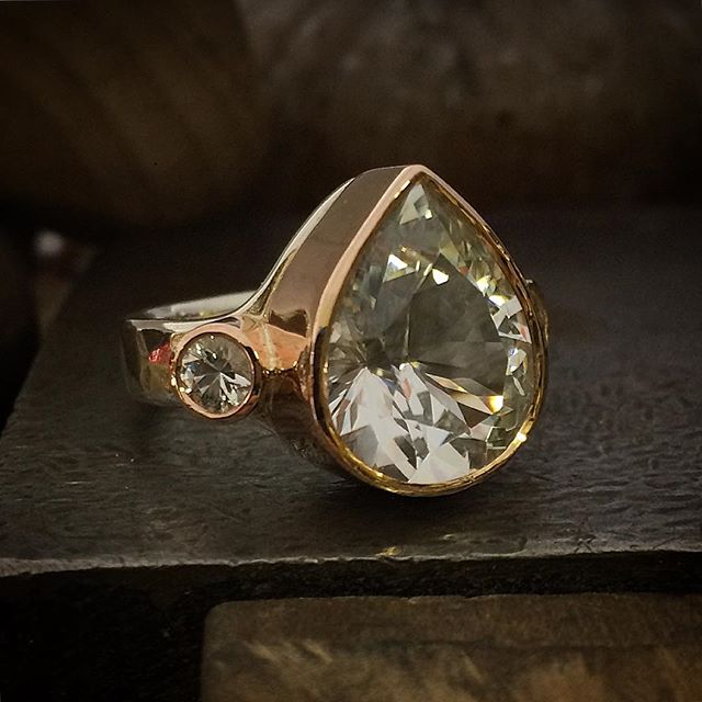 Very happy with this one!! Just under 10cts this bright white Killiecrankie Diamond is a stunner!! With two .61ct Killiecrankies/topaz either side, settings in Rose Gold on a silver band with a beaten texture. Size R