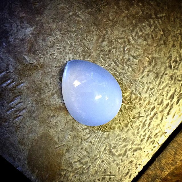 After much fussing around, reshaping and polishing this little....or not so little 15.8ct Blue Chalcedony teardrop is ready to set