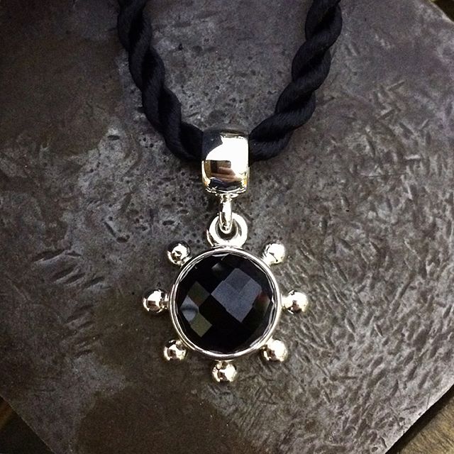 SALE!!
12mm high domed faceted Onyx set in Sterling silver. Comes with a beautiful quality silk rope cord. This pendant is sweet little one! 31mm long including the bail and 20mm wide. Was $495 on its own. Now $295 including cord! Postage is extra. Message me on Instagram or Facebook or comment Sold. First in best dressed. Thanks!