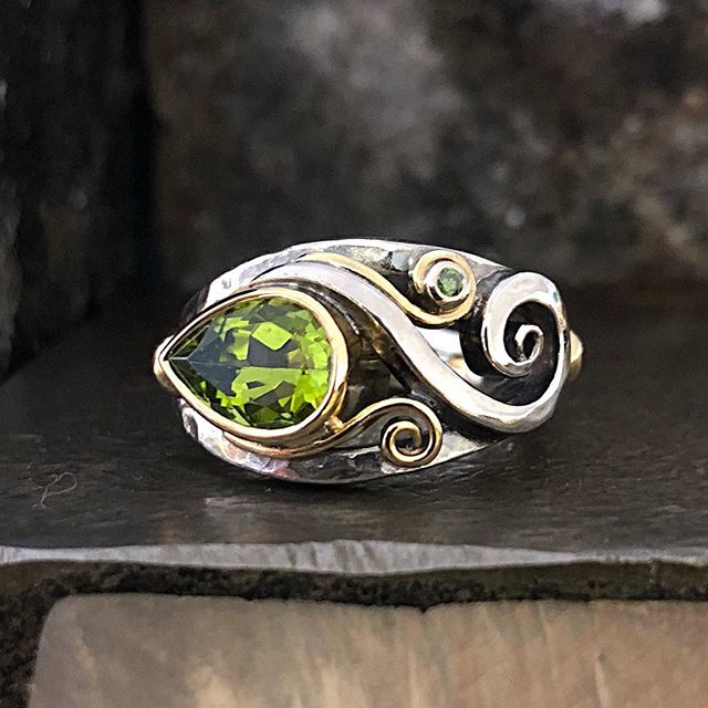 This is the finished result of a ring I showed in the making a few posts down. The peridot is so beautifully vibrant and I set it off with a tiny green diamond. The settings and the finer details are rich 18ct Yellow gold with a chunky free formed sterling silver band and spirals. This ring reminds me of the sea and it’s creatures. This one is on display at Art Untamed, Dennes Point Bruny Island Tasmania